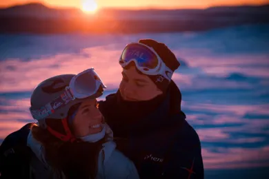 Couple on snowmobile